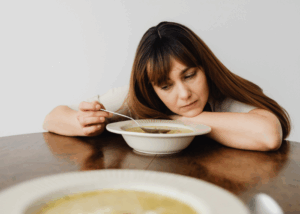 a woman struggling with rumination disorder