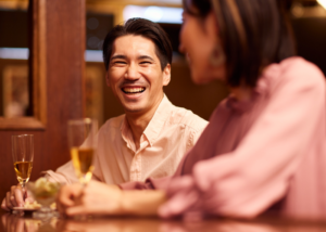 two people having a drink at the bar