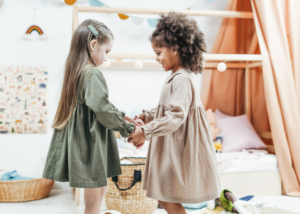 two little girls playing together