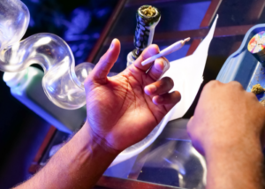 someone holding a weed joint